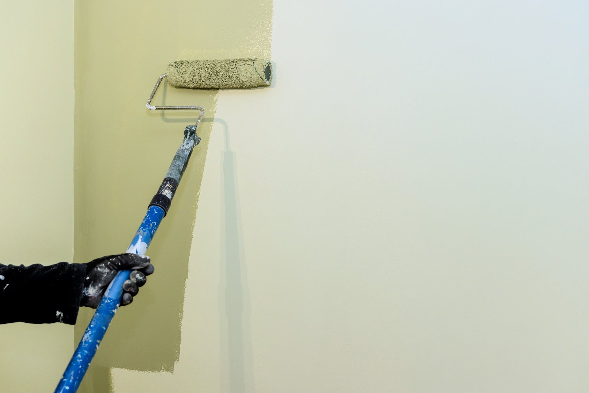 Professional painter working on home renovation